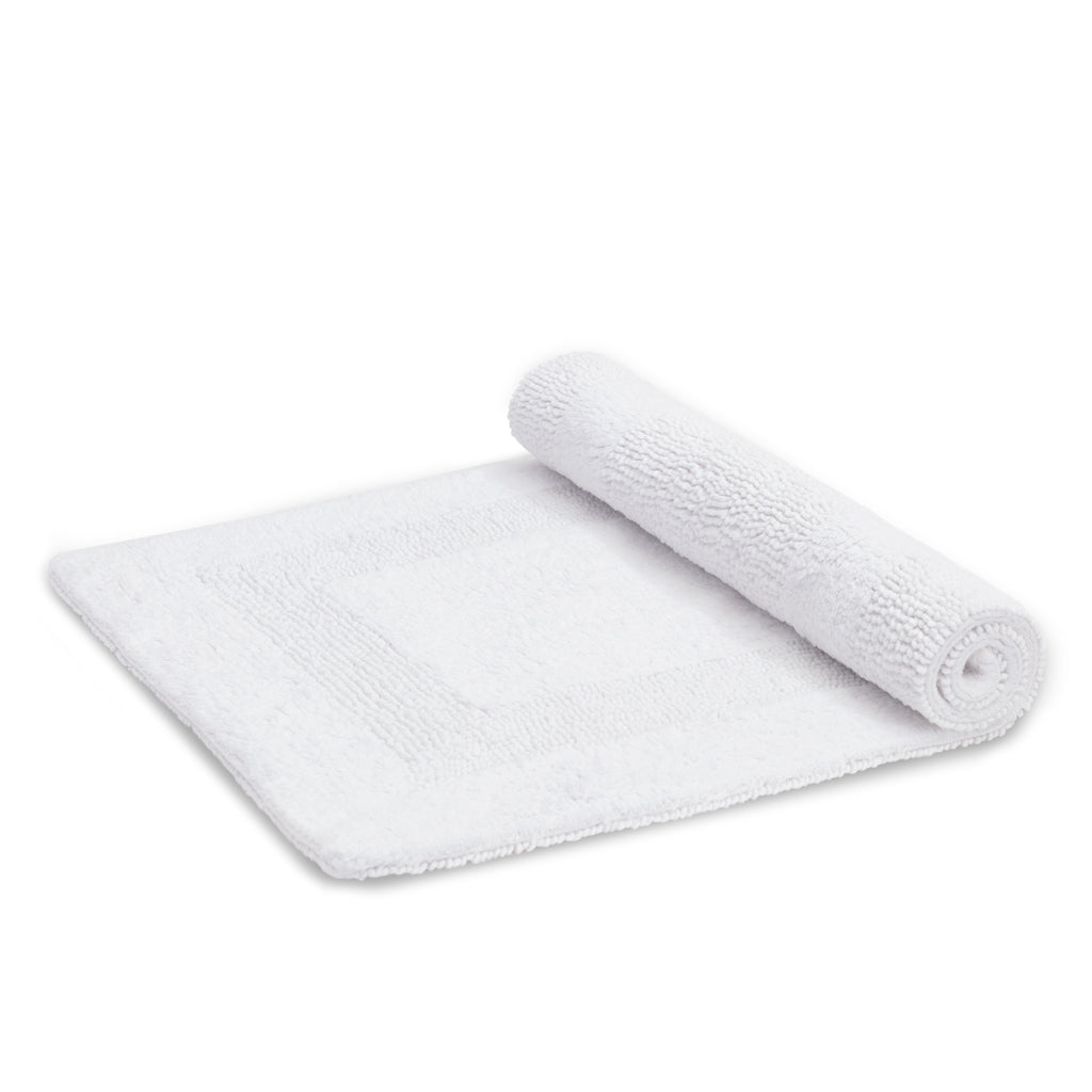 The White Tufted Border Bath Mat