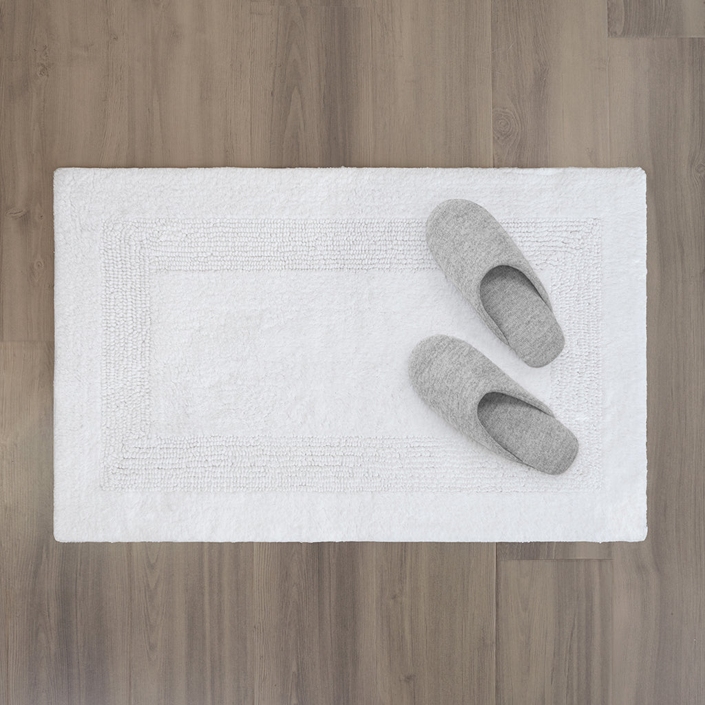 The White Tufted Border Bath Mat