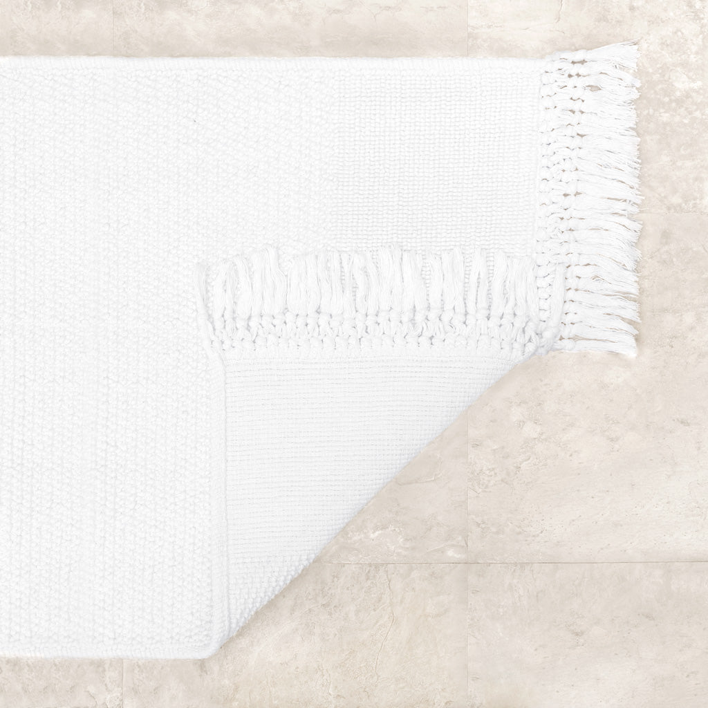 The White Fringed Textured Bath Mat