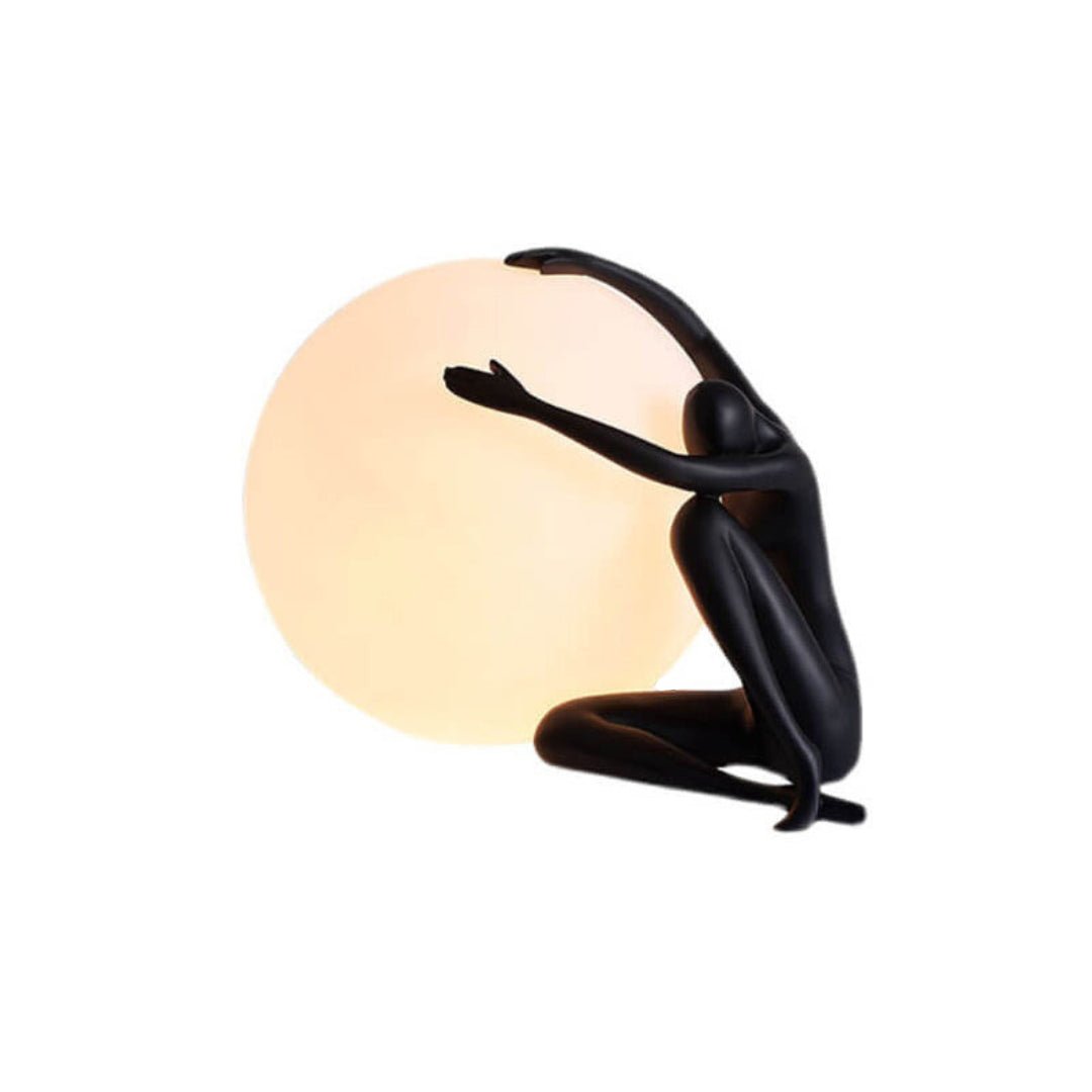 Humanoid Ball Holding Table Lamp