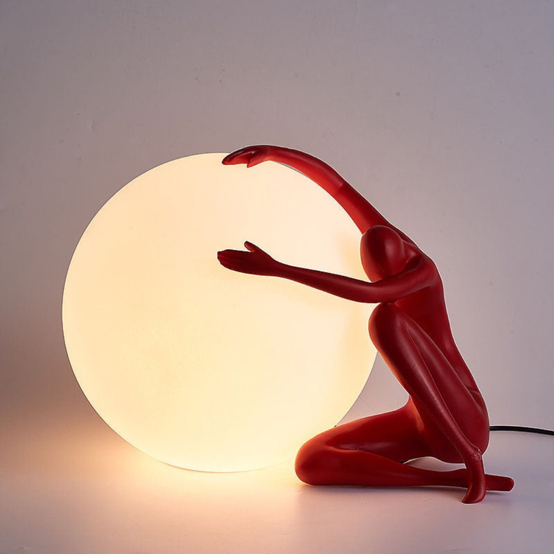 Humanoid Ball Holding Table Lamp