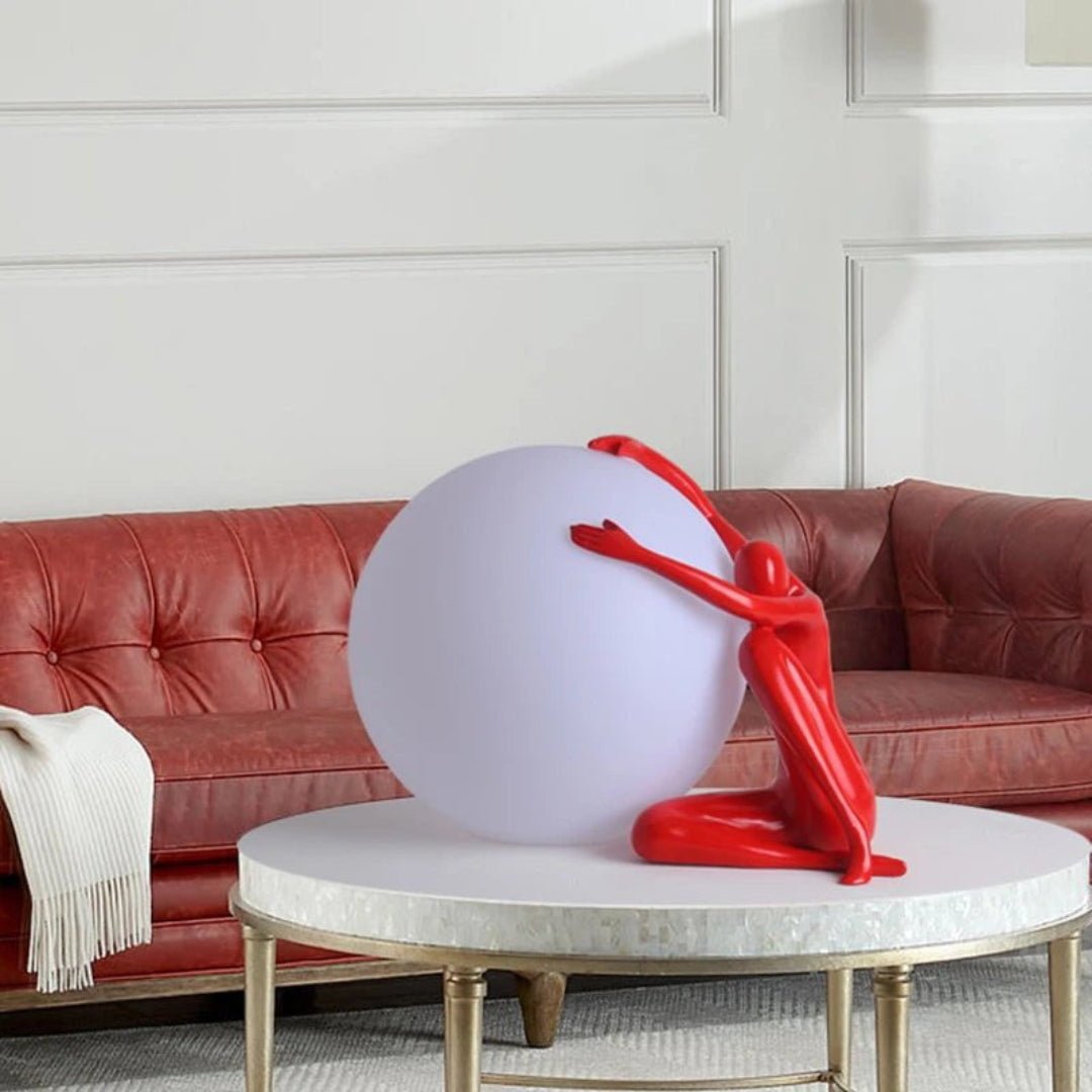 Humanoid Ball Holding Table Lamp