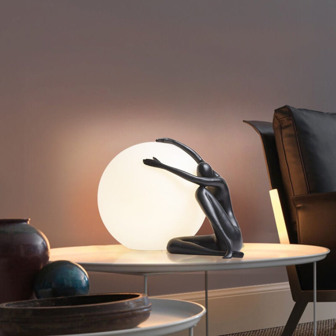 Humanoid Ball Holding Table Lamp