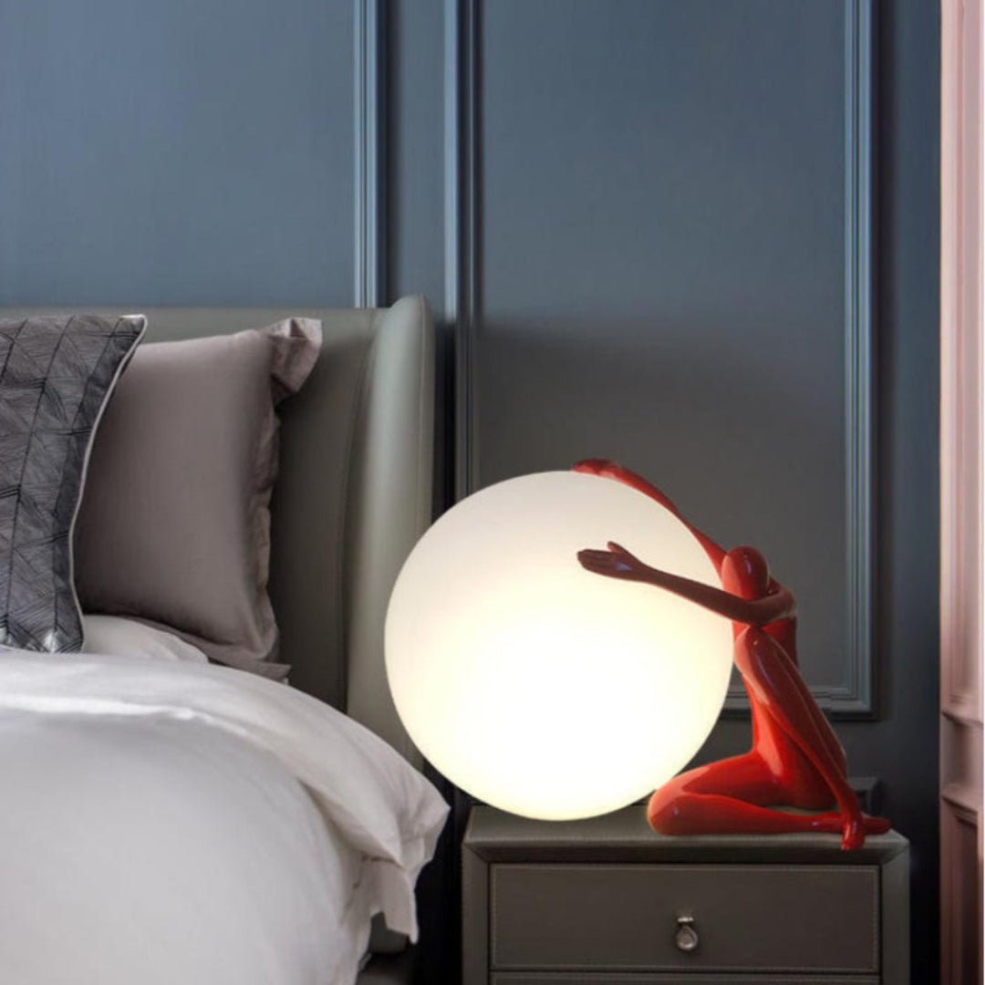 Humanoid Ball Holding Table Lamp