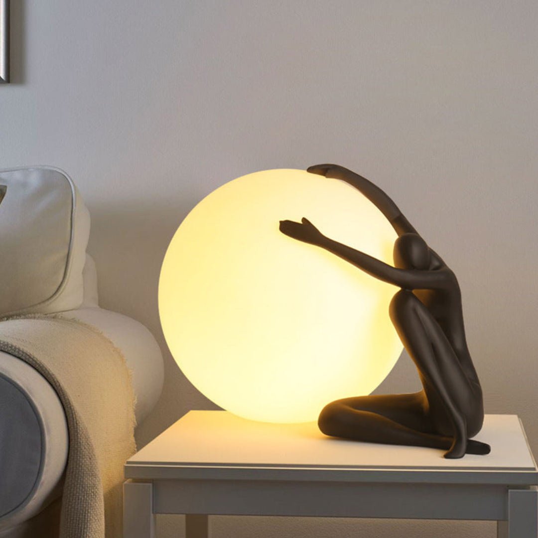 Humanoid Ball Holding Table Lamp